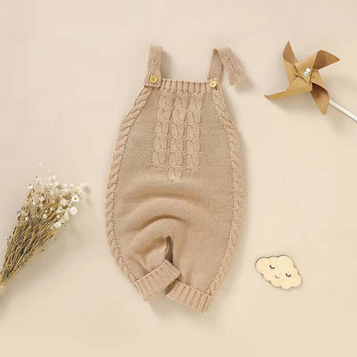 Tiny Royalty KnitNest solid color sleeveless baby romper in beige with cable knit design