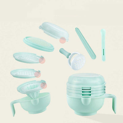 Tiny Royalty baby food supplement grinder with multiple attachments and mint green design.