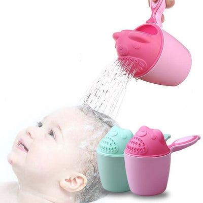 Tiny Royalty Children Shampoo Cups pouring water over a baby during bath time, made of BPA-free plastic.